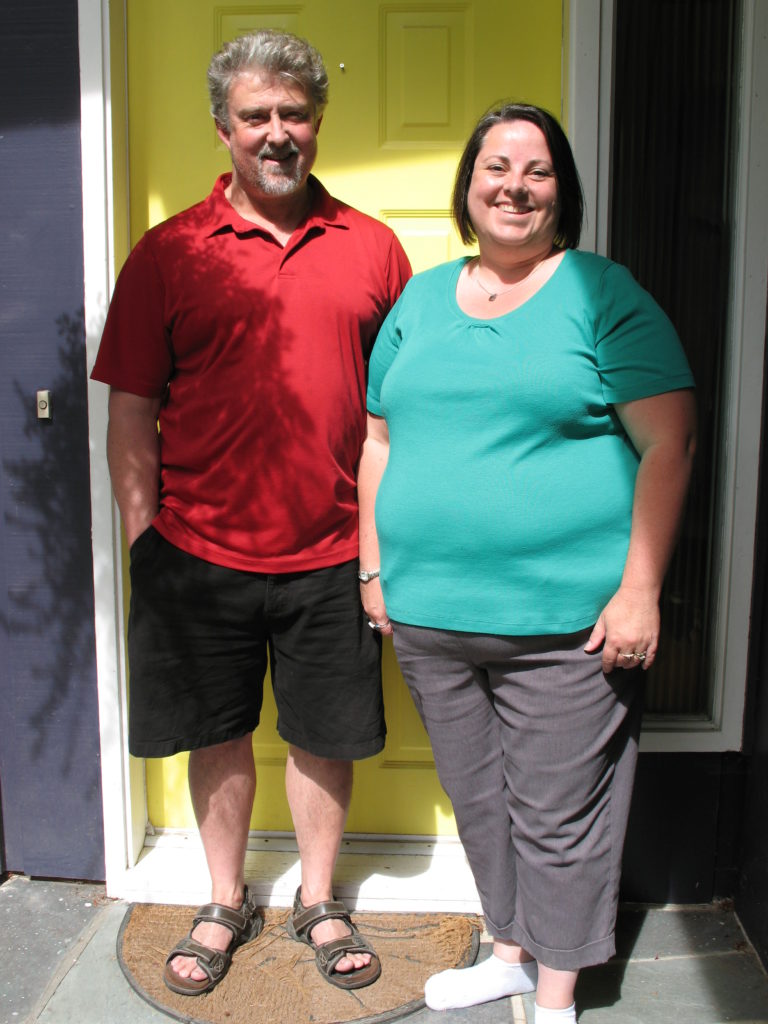 Martin & Rhianfa Riel at their front door.