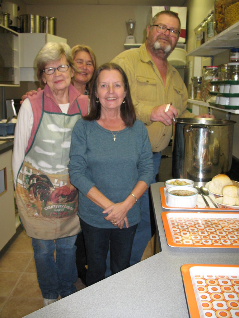 Kitchen volunteers Helga, Kathy, Joanne & Mike
